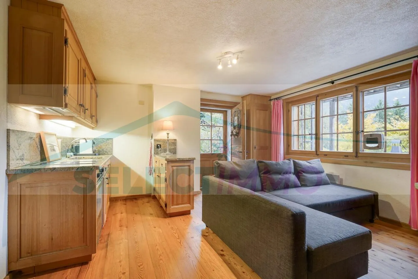 This warm chalet nestled in the heart of nature, quiet and sheltered from prying eyes, also benefits from a magnificent panorama and optimal sunshine - Photo 12 of 14