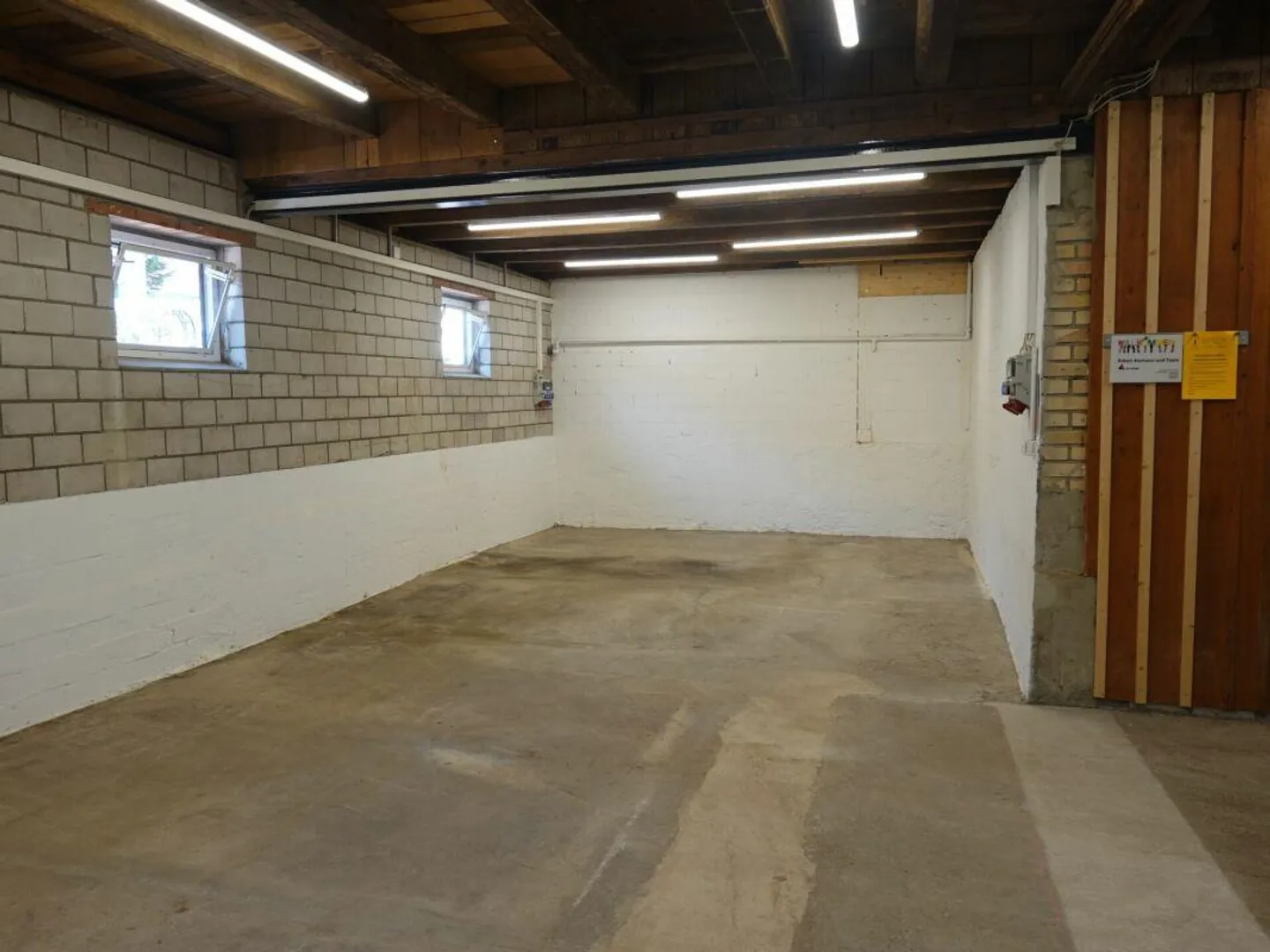 Ground-level, bright, practical commercial or storage space - Photo 2 of 3