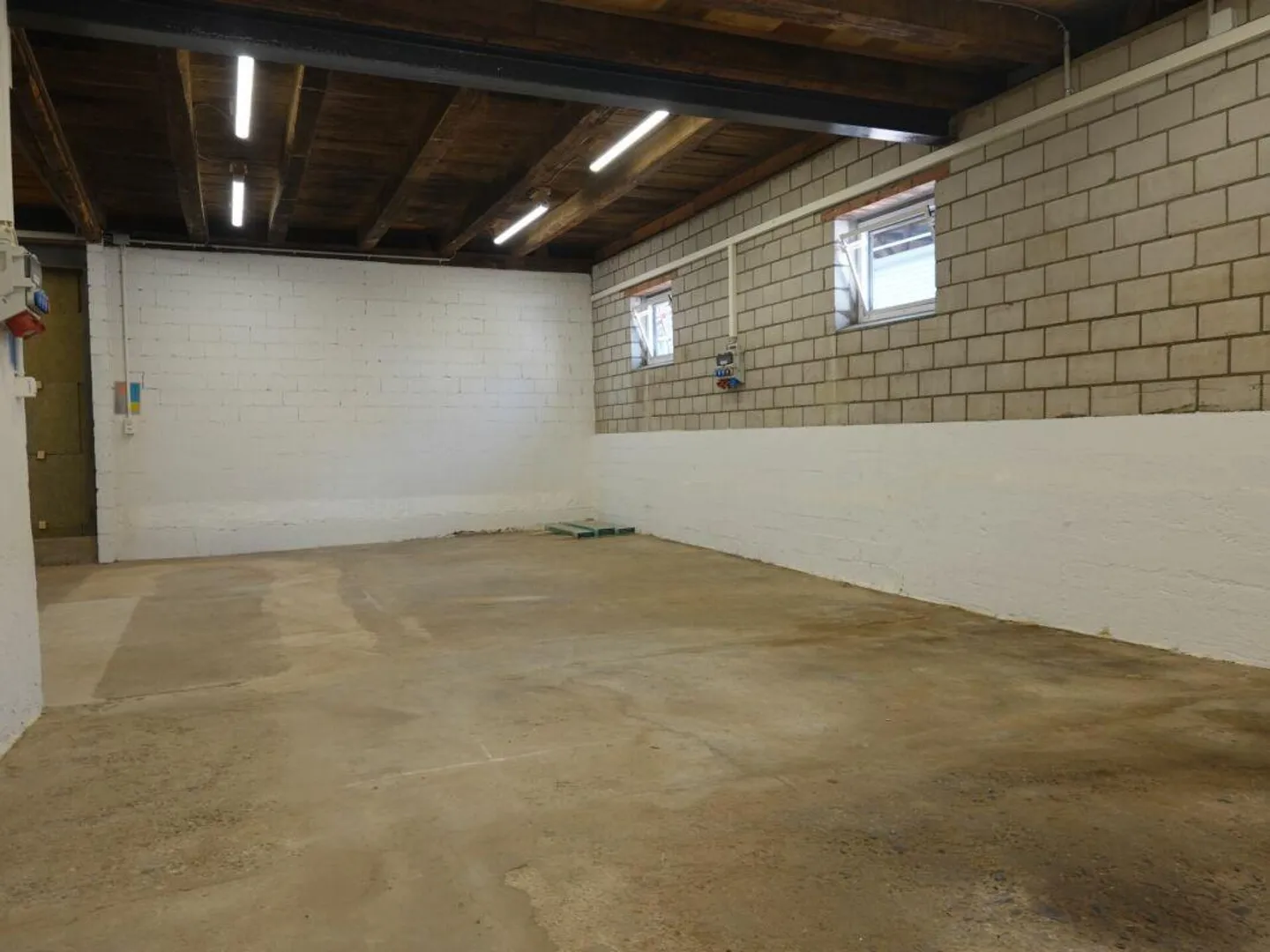 Ground-level, bright, practical commercial or storage space - Photo 3 of 3