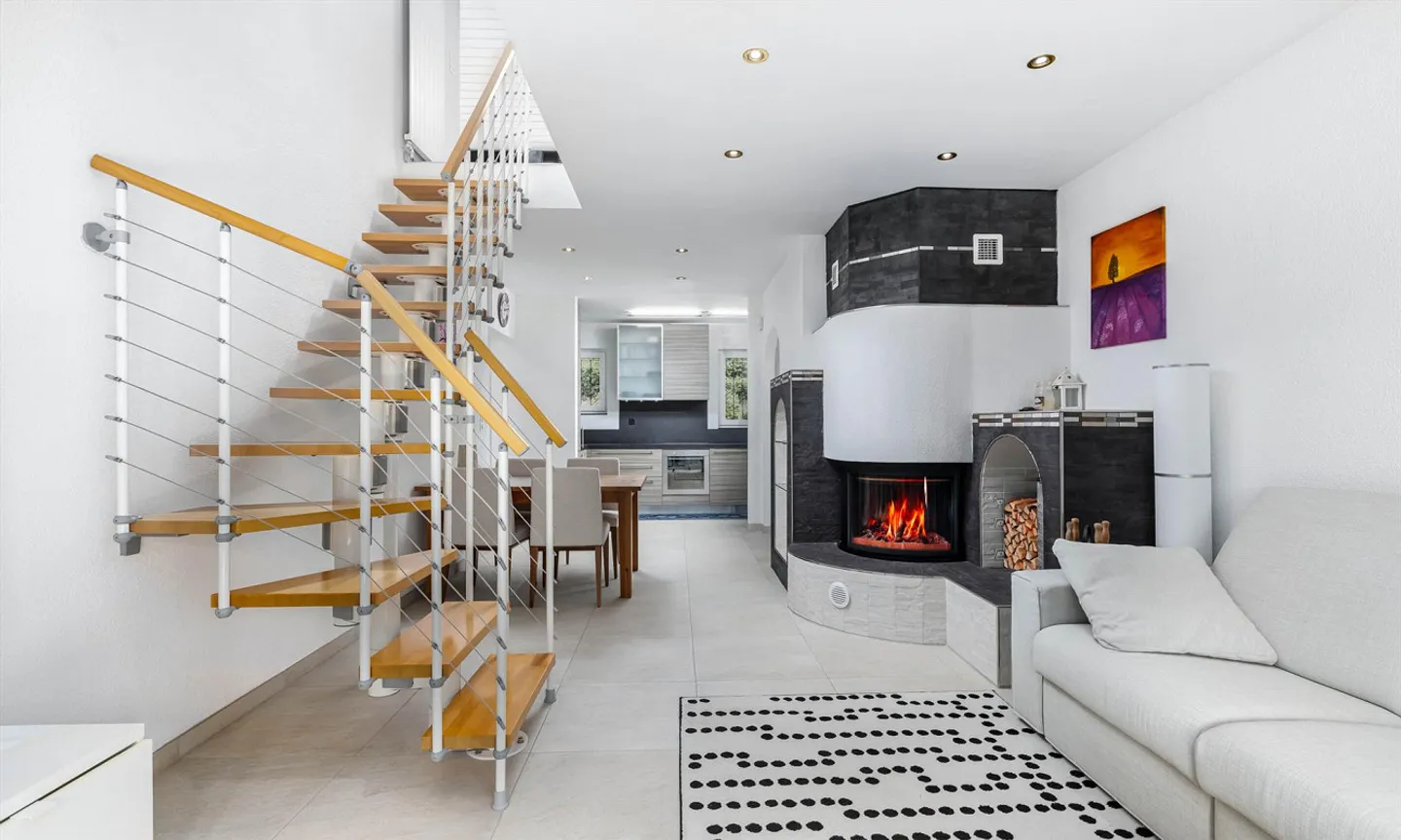 Beau penthouse avec 3,5 pièces et vue sur le lac à Melano - Photo 1 sur 11