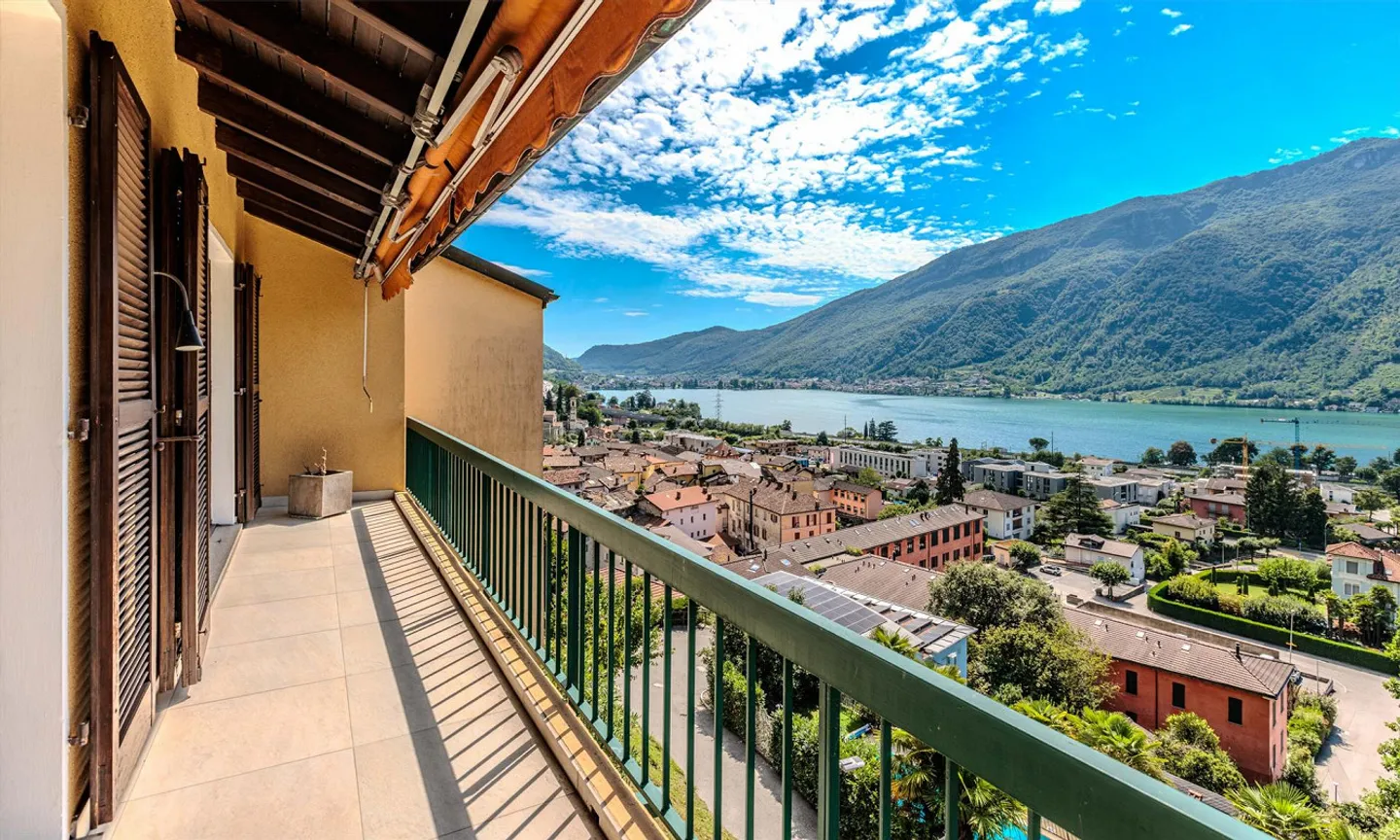 Beau penthouse avec 3,5 pièces et vue sur le lac à Melano - Photo 7 sur 11