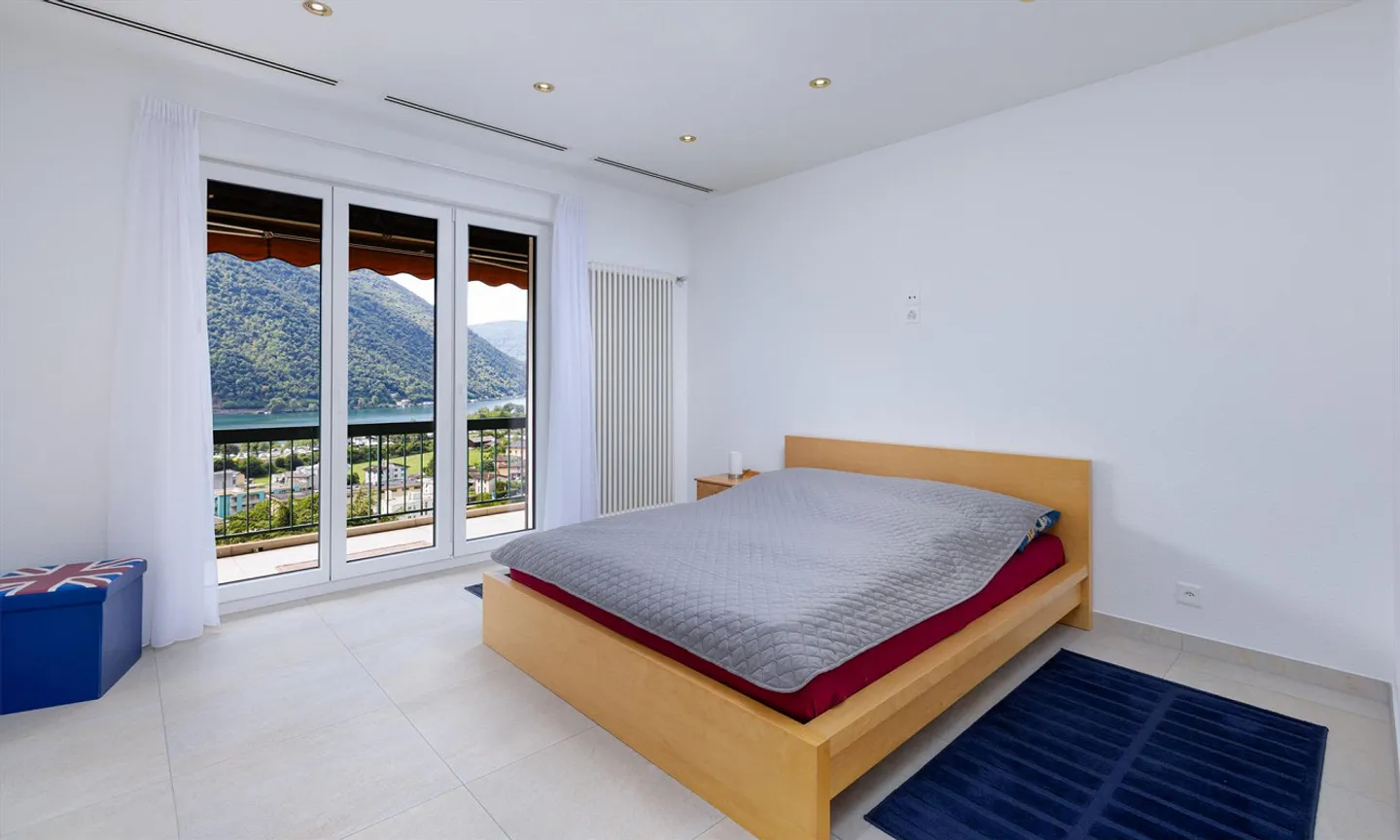 Beau penthouse avec 3,5 pièces et vue sur le lac à Melano - Photo 6 sur 11