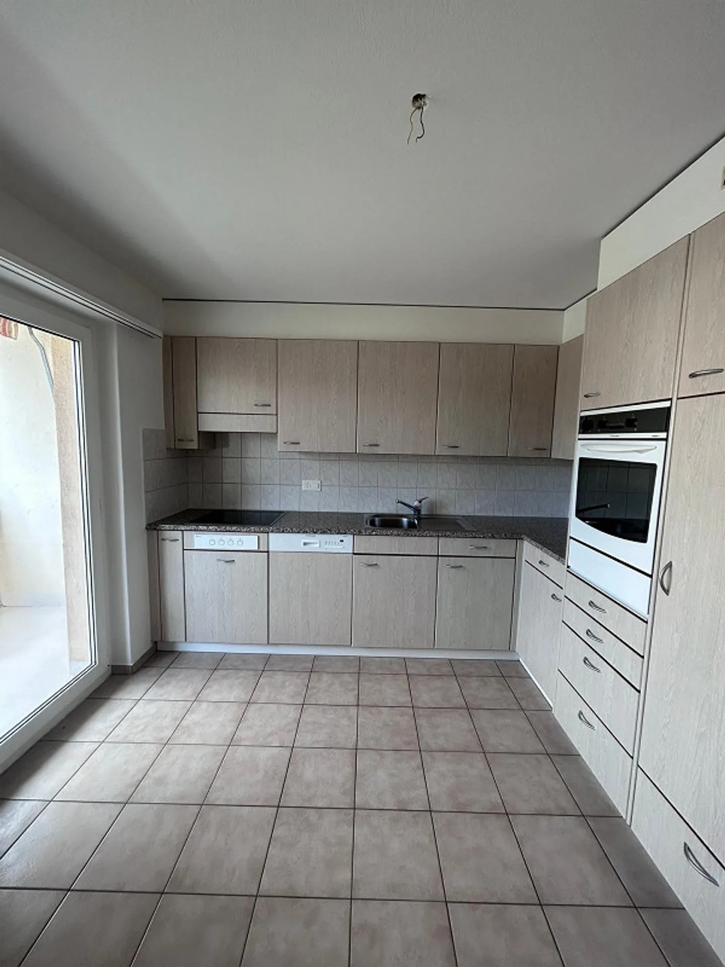 Geräumige Familienwohnung in Wünnewil - Foto 4 von 10