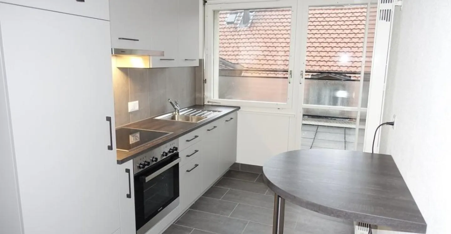 Bel appartement avec terrasse - Photo 2 sur 7