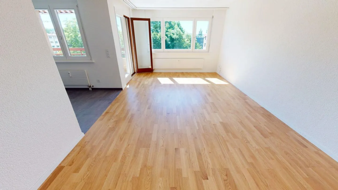 Charmante Wohnung mit grossem Balkon - Foto 4 von 11