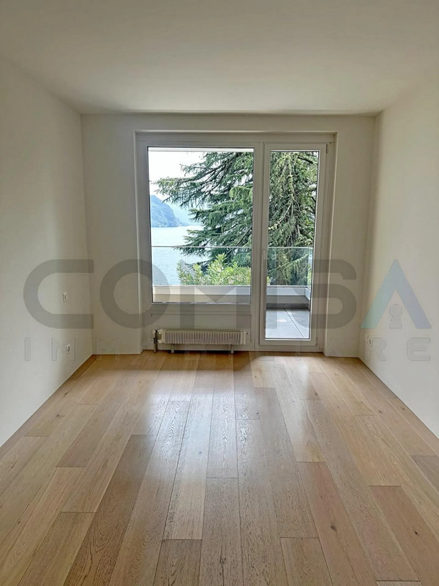 Wohnung mit Seeblick und Pool - Foto 4 von 6
