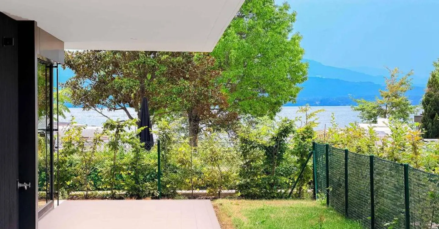 Neues 5,5-Zimmer-Apartment mit überdachter Terrasse und Garten - Foto 8 von 11