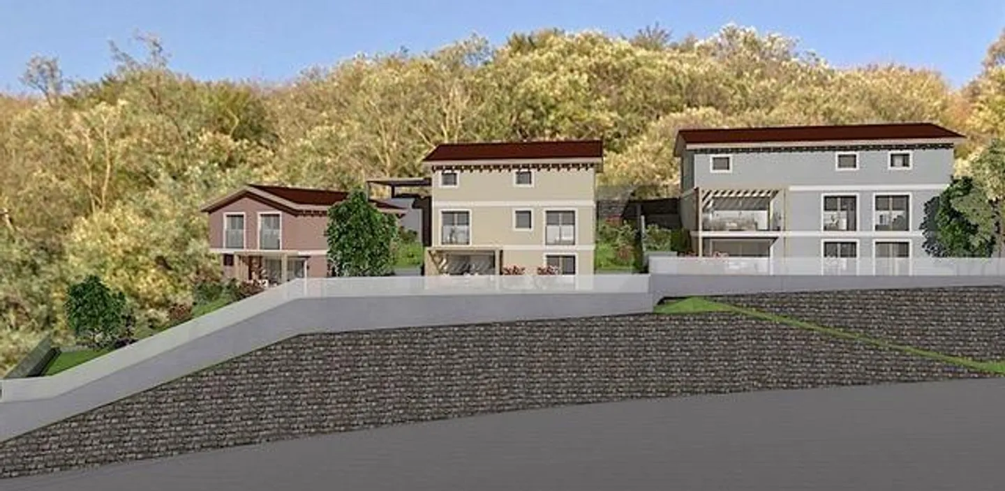 Terreno R2 di 1087 m2 col progetto approvato per 2 case, 2 appartam... - Foto 1 di 14