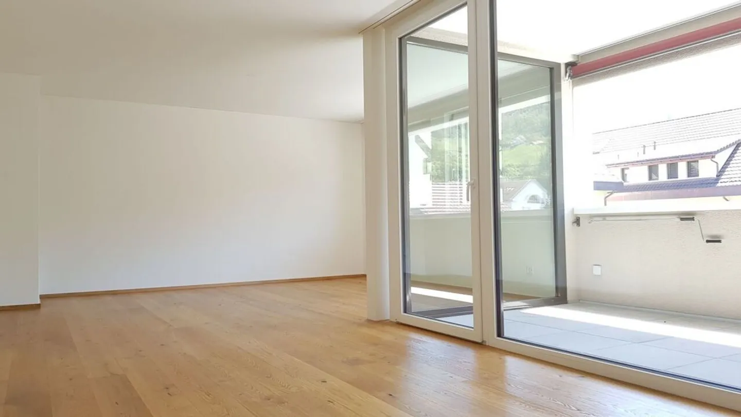 Appartement 3,5 pièces neuf avec emplacement central - Photo 4 sur 9