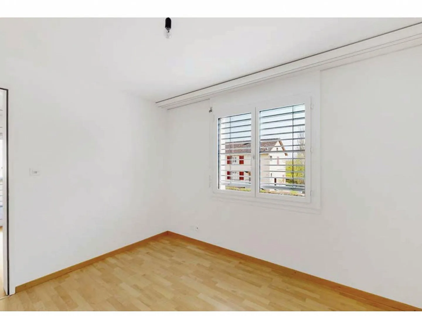 Appartement 3.5 pièces, 2 places de parking dans le garage souterrain incluses - Photo 4 sur 5