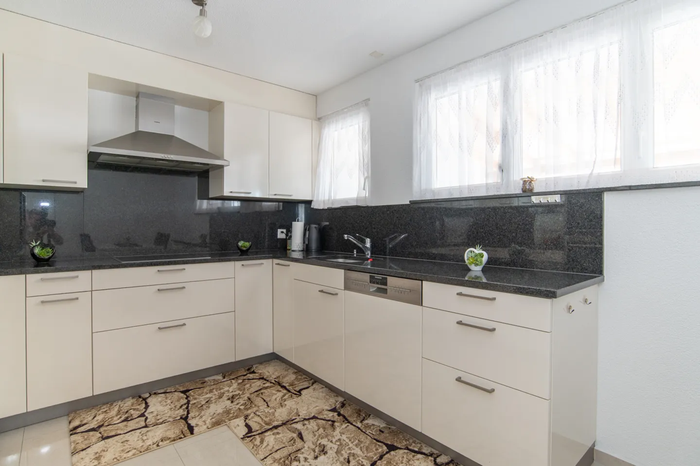 Completely Renovated Three-Family House in a Quiet yet Central Location - Photo 11 of 13