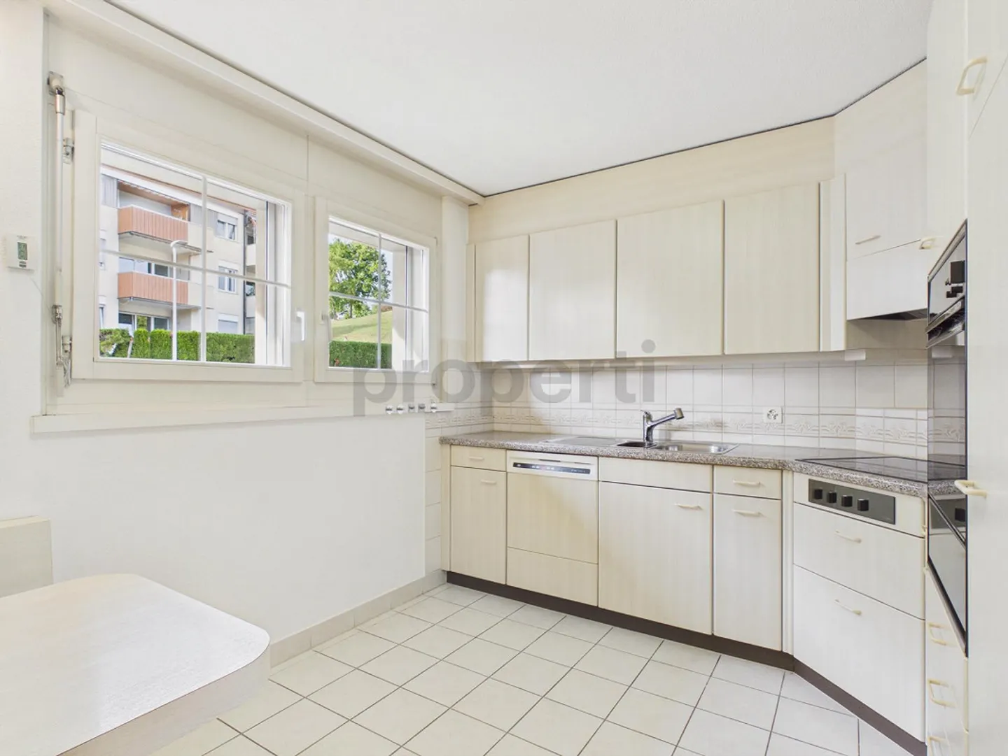 Appartement charmant avec vue sur la verdure - Photo 2 sur 10