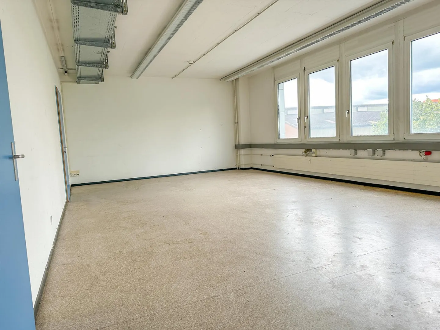 Versatile commercial space with industrial charm in Reinach - Photo 3 of 4