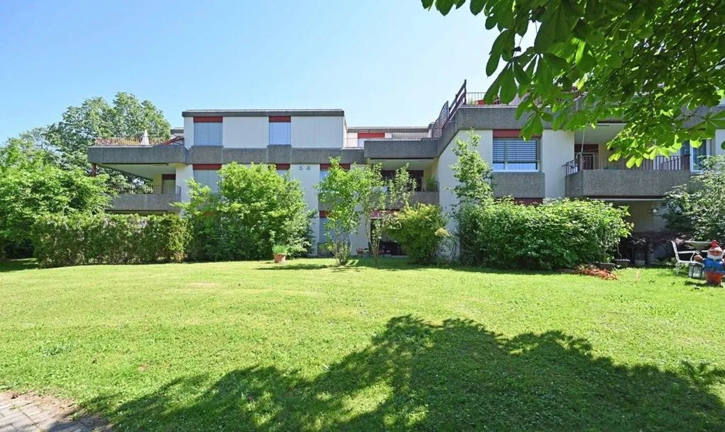 Parterrewohnung mit Sitzplatz und Blick ins Grüne - Foto 1 von 12