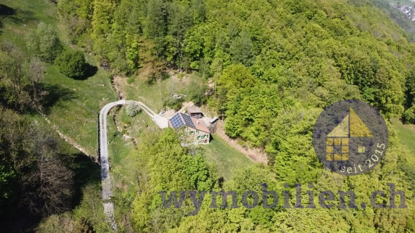 Jewel surrounded by meadow and stream - Photo 1 of 8