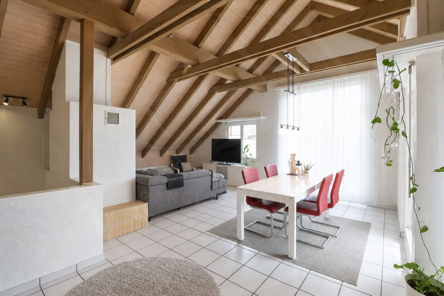 Appartement en duplex 4½ pièces avec caractère de vie particulier à Oberrohrdorf à vendre - Photo 1 sur 15