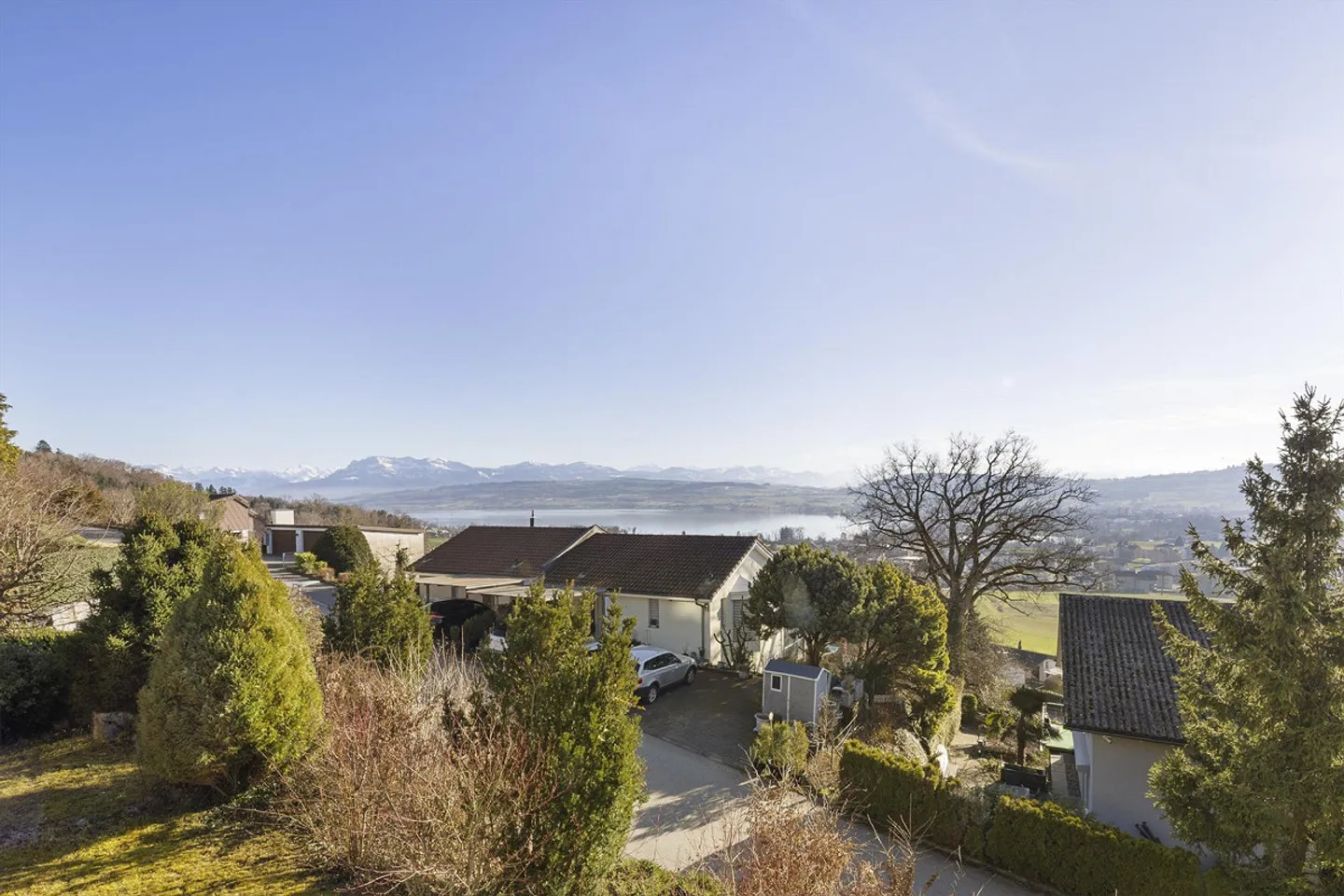 Living of the Extra Class with Lake and Mountain View as well as Indoor Pool - Photo 1 of 2
