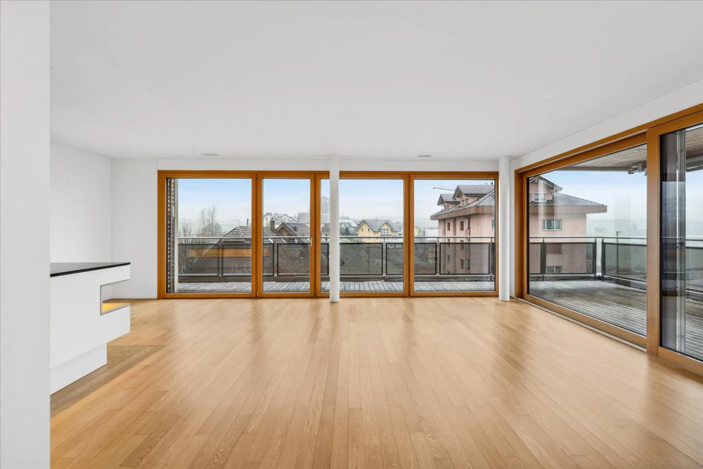 Moderne Attika-Wohnung im Mülipark - Foto 2 von 7