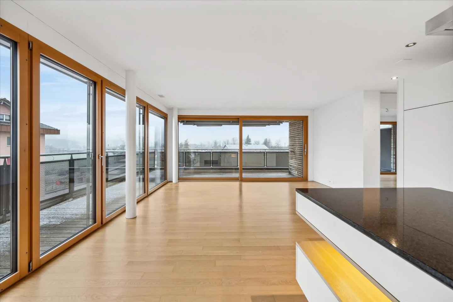 Moderne Attika-Wohnung im Mülipark - Foto 3 von 7