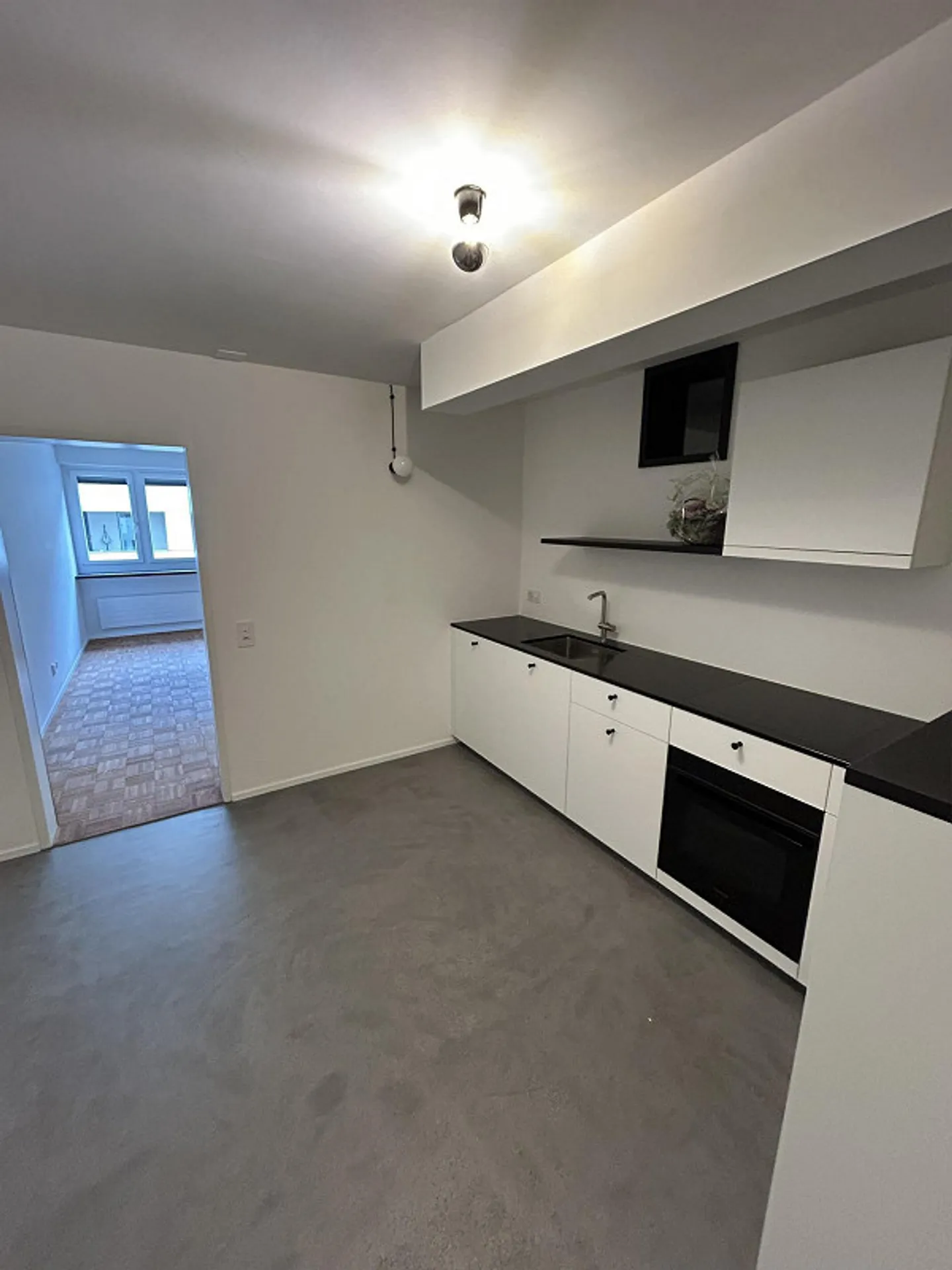 Il tuo appartamento di 2,5 stanze direttamente sul Reno - Foto 1 di 8