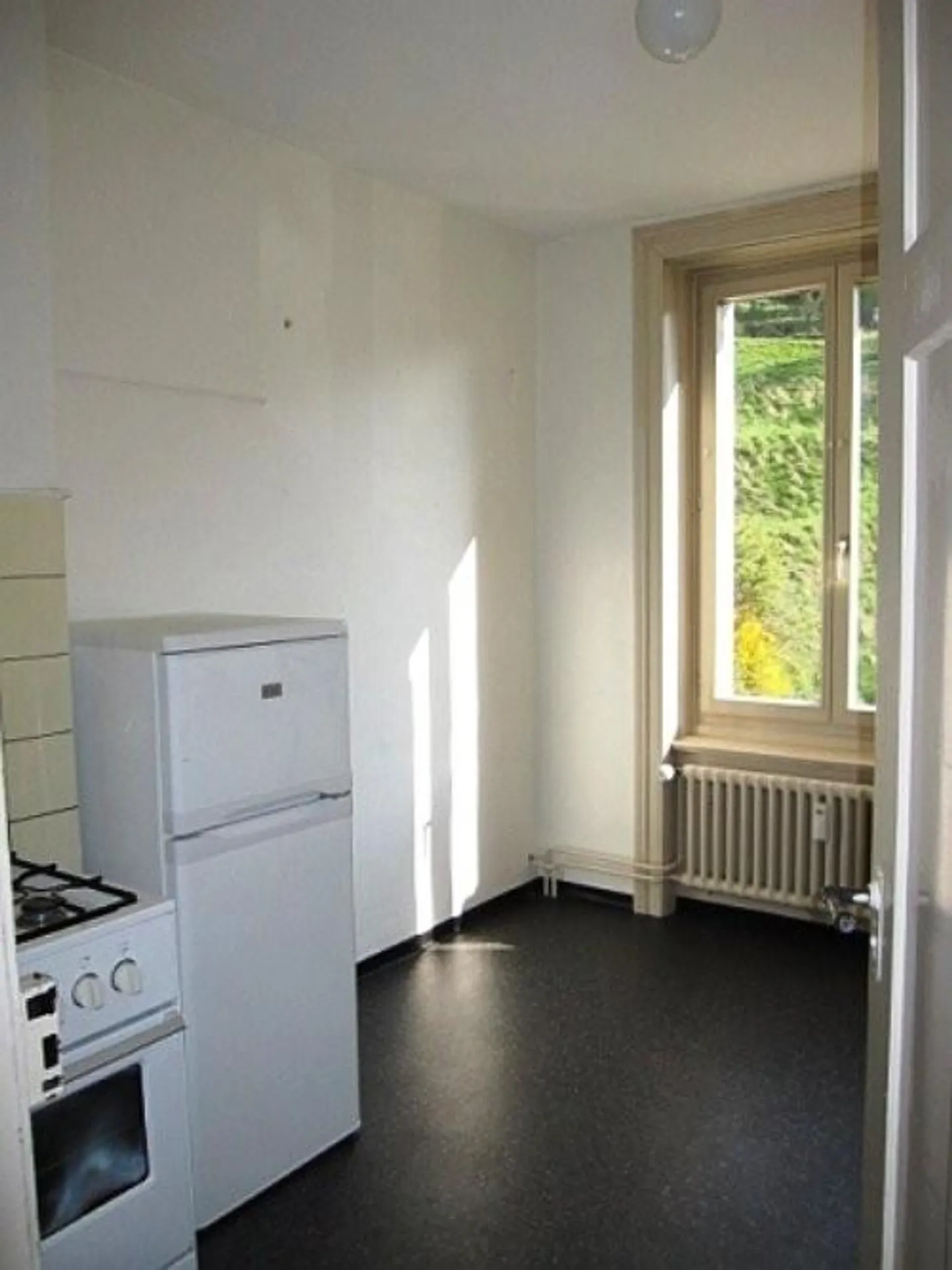 Appartement ancien à la périphérie ouest du centre-ville - Photo 2 sur 5