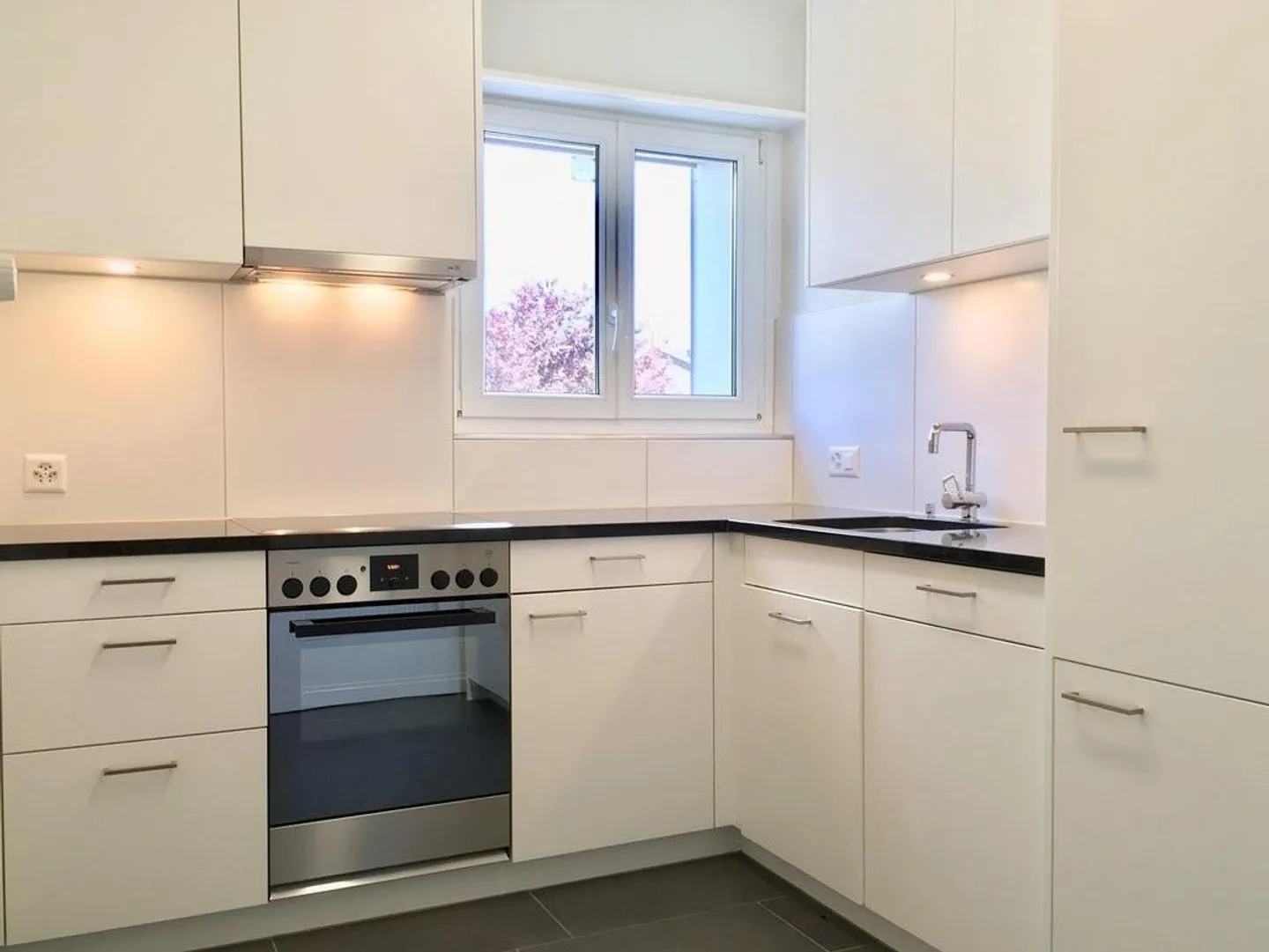 Traumhafte Erdgeschosswohnung mit eigenem Sitzplatz - Foto 3 von 7