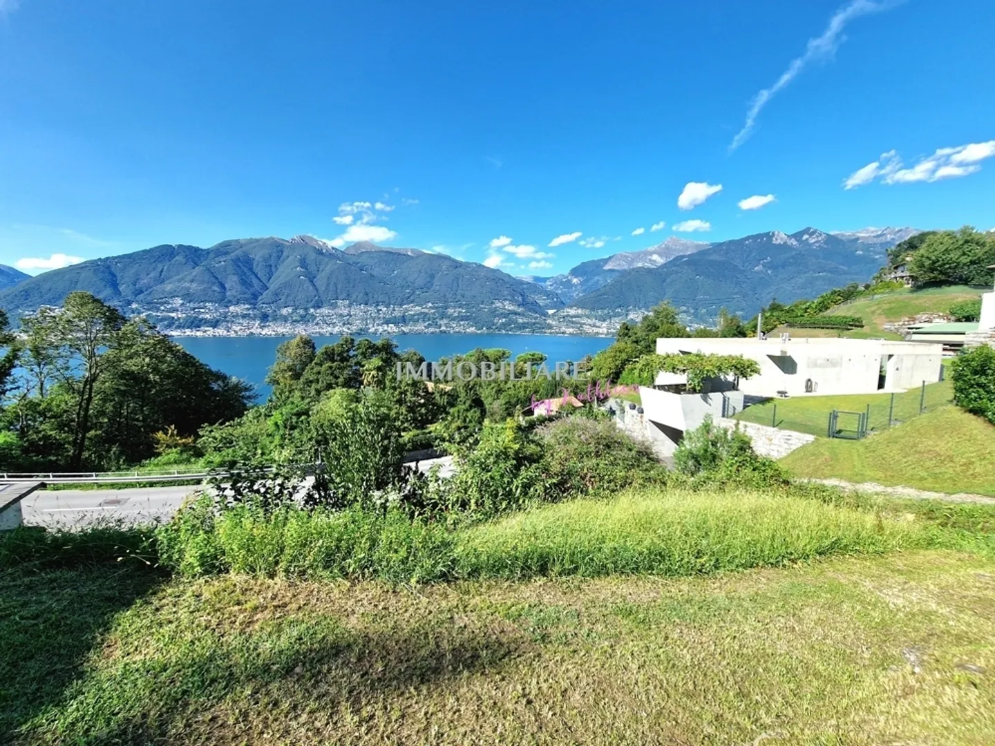 Appartamento Duplex con Ascensore e Vista Mozzafiato sul Lago, Nuova Costruzione, Minergie, Giardino - Foto 8 di 11