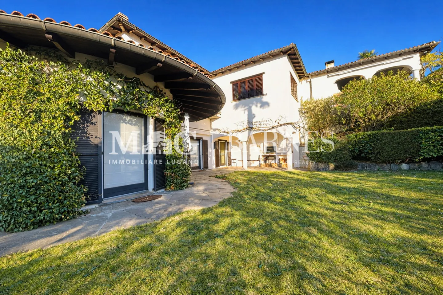 Comano: Wohnung 4.5/5.5 Zimmer mit privatem Garten und Pool - Foto 1 von 9