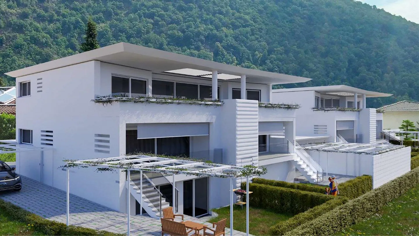 Appartamento Duplex con giardino e posteggi - Foto 1 di 13