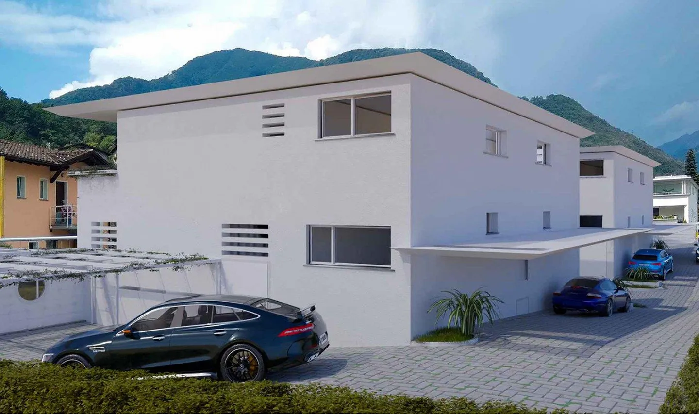 Appartamento Duplex con giardino e posteggi - Foto 4 di 13