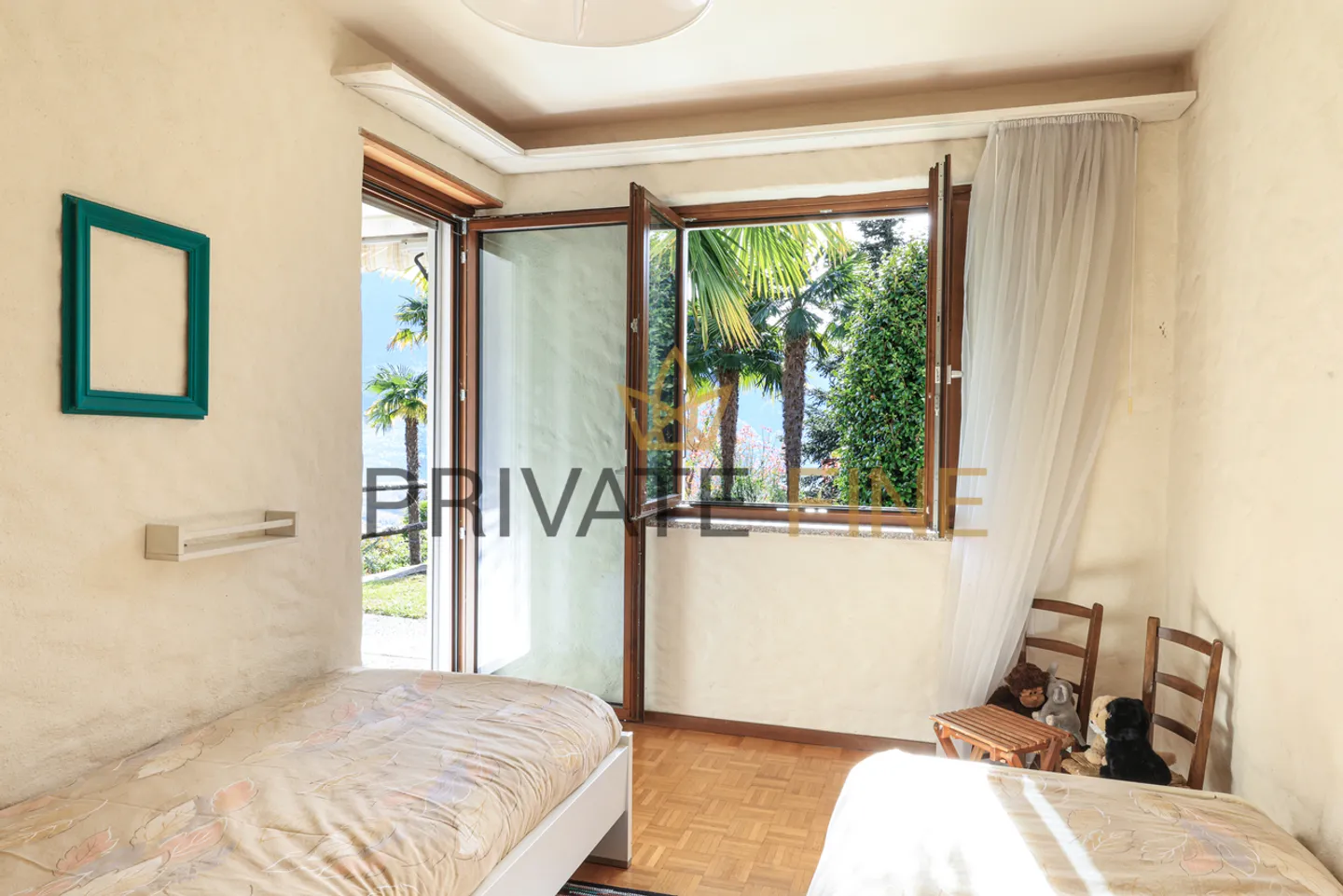 Casa a schiera con magnifica vista sul lago, giardino e seconda casa - Foto 9 di 16