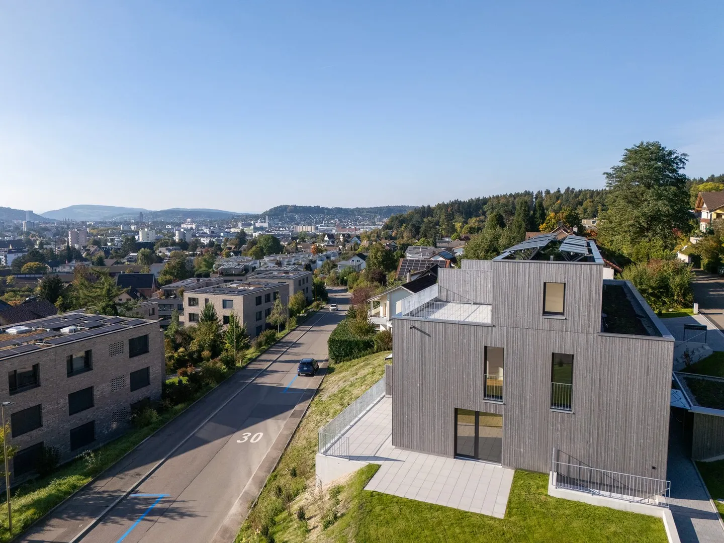 Charmante Familienhäuser - Foto 3 von 17