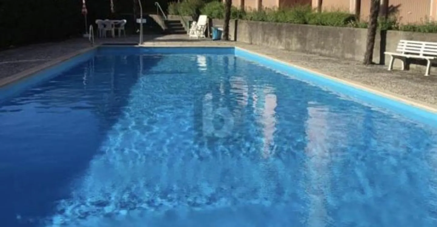BRIGHT WITH POOL - Photo 2 of 5