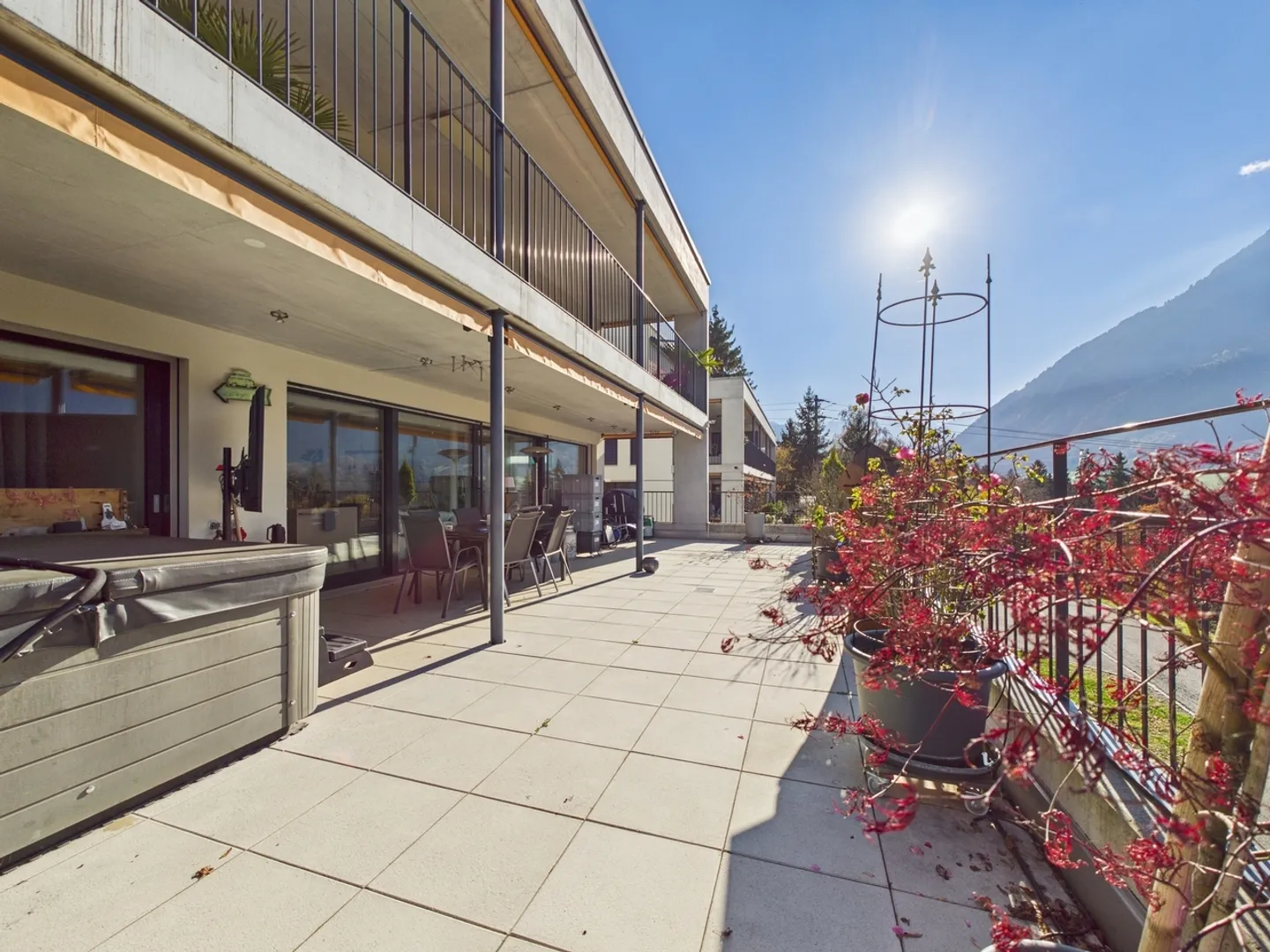 Huge panoramic terrace with mountain view, designer kitchen with cooking island, parking garage with e-charging station & outdoor parking! - Photo 10 of 11