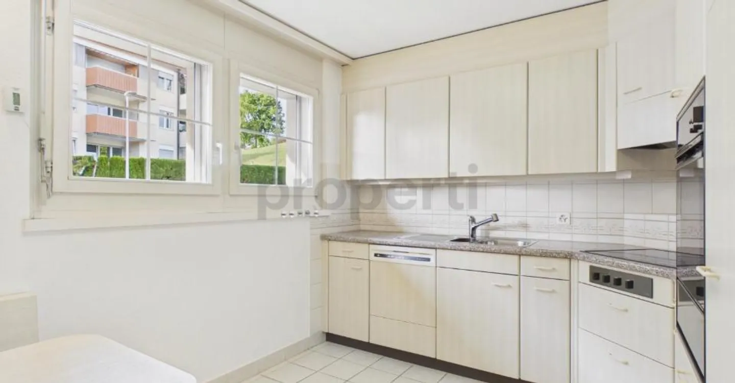 Appartement charmant avec vue sur la verdure - Photo 2 sur 8