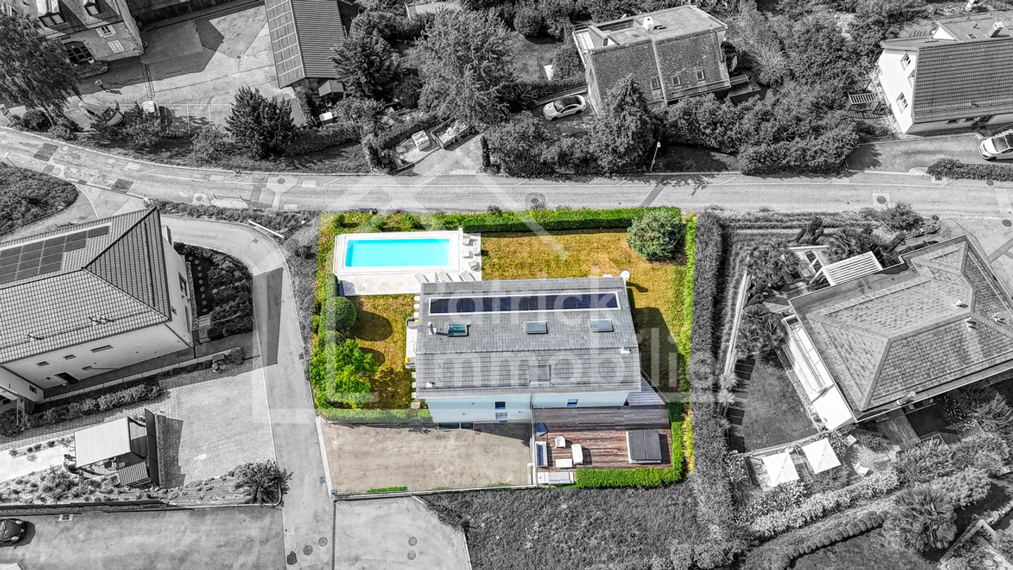 Außergewöhnliche zeitgenössische Immobilie mit Panoramablick auf den See - Foto 19 von 21