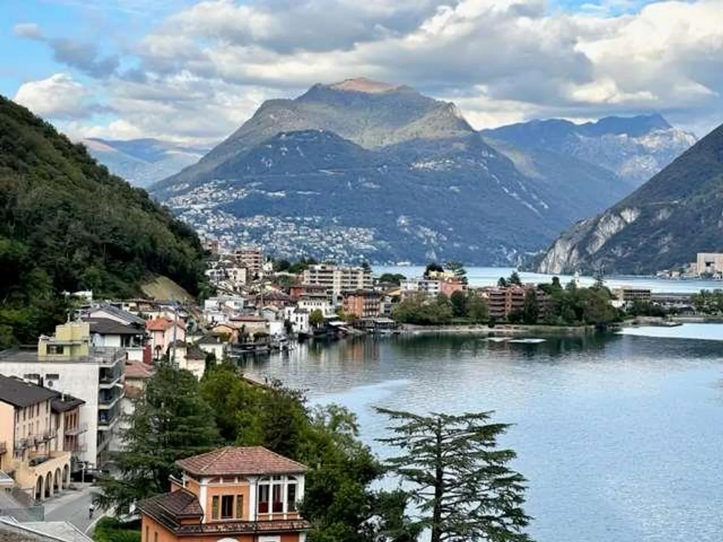 Attico di alto standard con vista lago a Melide - Foto 1 di 13