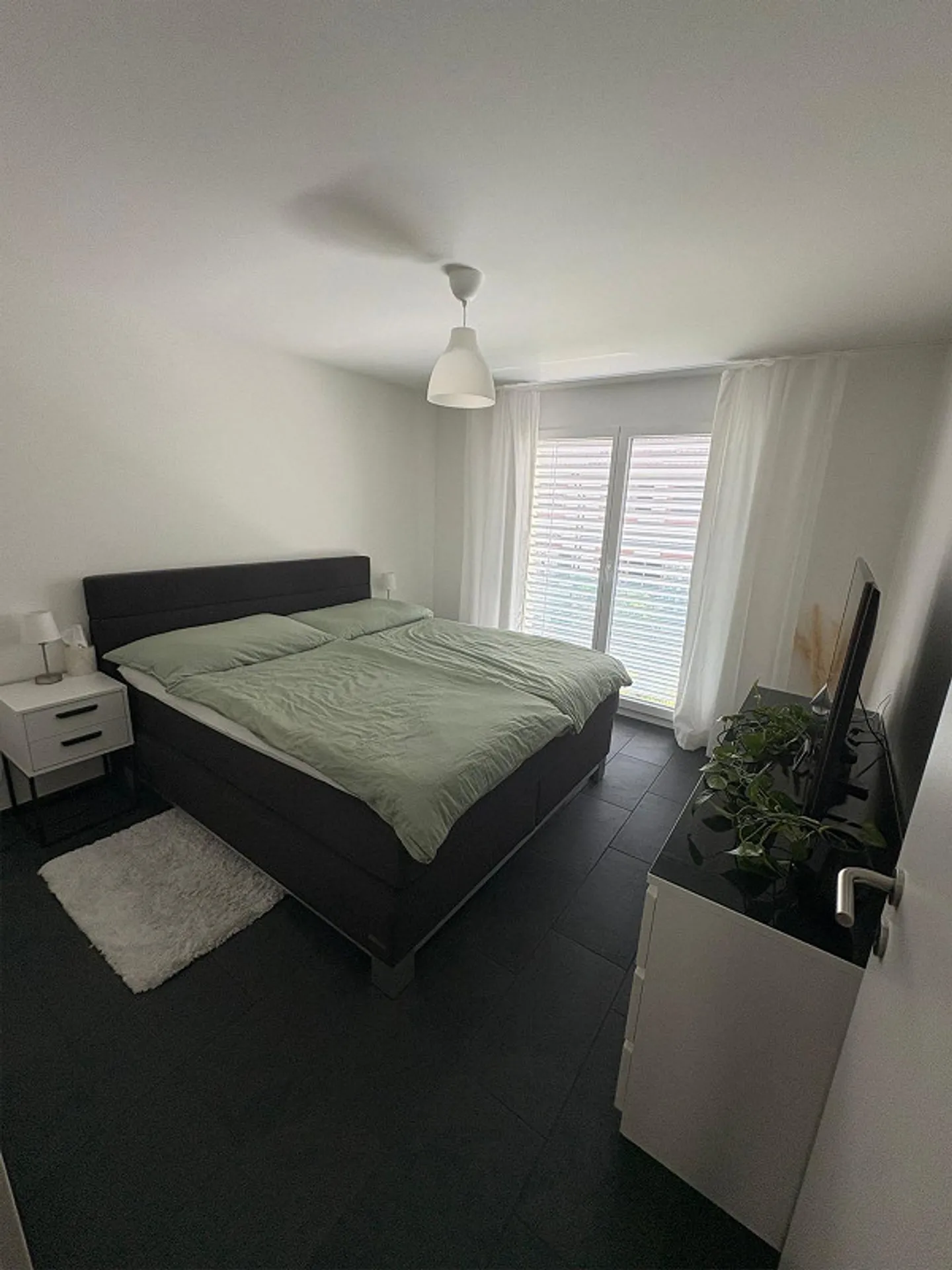 Appartement lumineux de 4,5 pièces incluant une place de parking dans le garage souterrain - Photo 5 sur 11