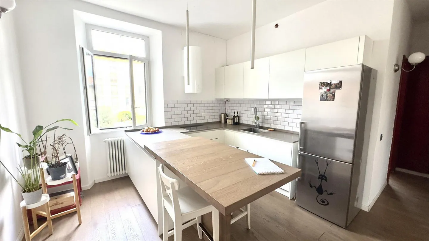 Appartement accueillant de 2,5 pièces avec terrasse couverte - Photo 3 sur 9