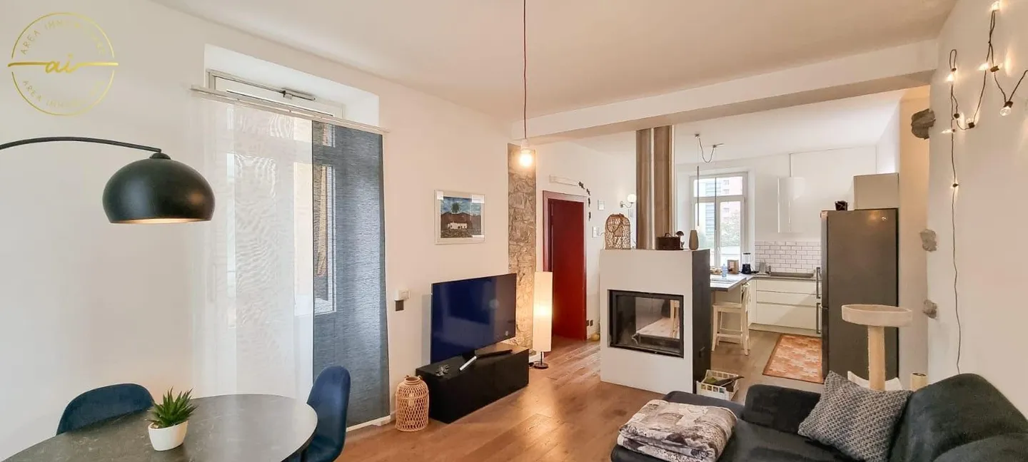 Appartement accueillant de 2,5 pièces avec terrasse couverte - Photo 5 sur 9