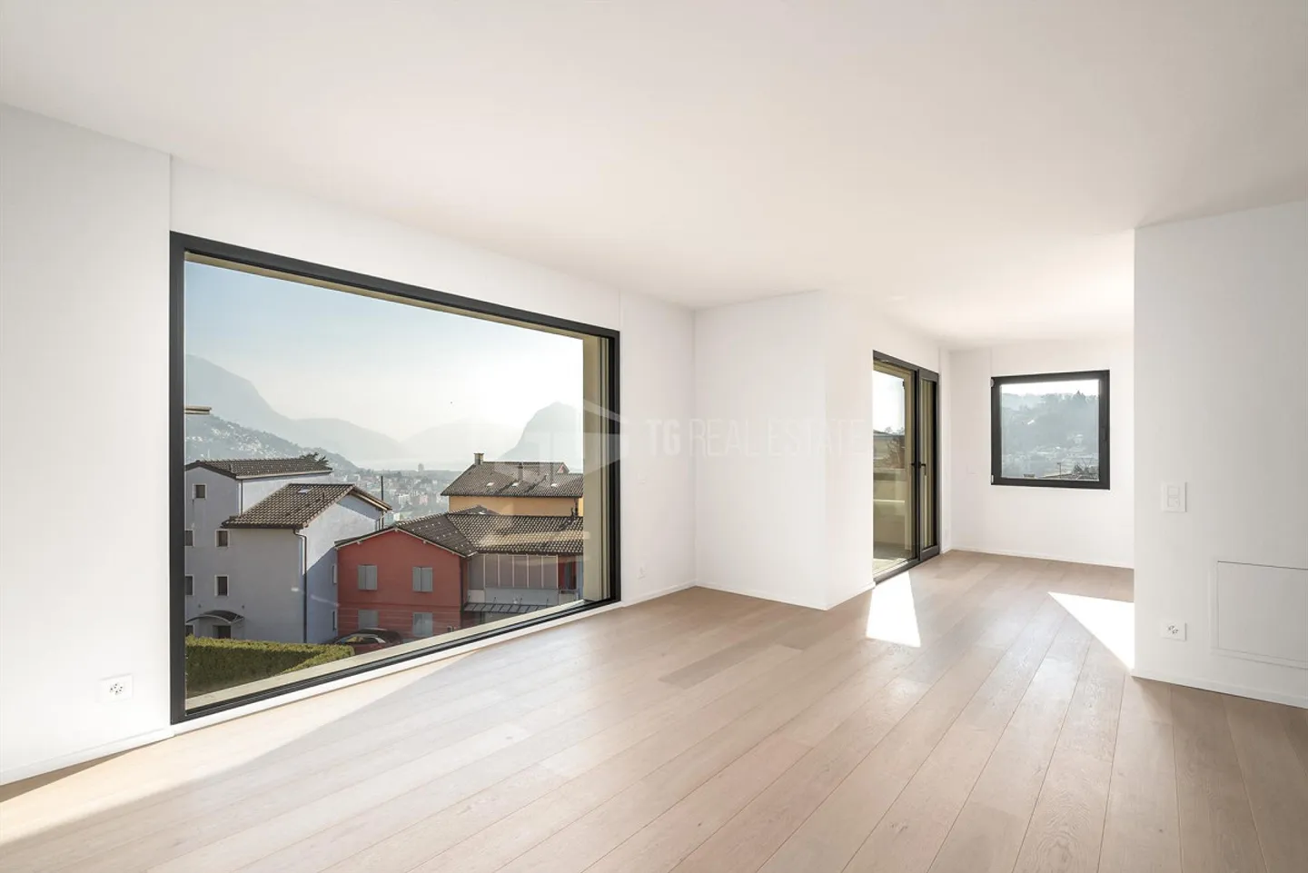 Charmante Dachgeschosswohnung mit Seeblick - Foto 1 von 13