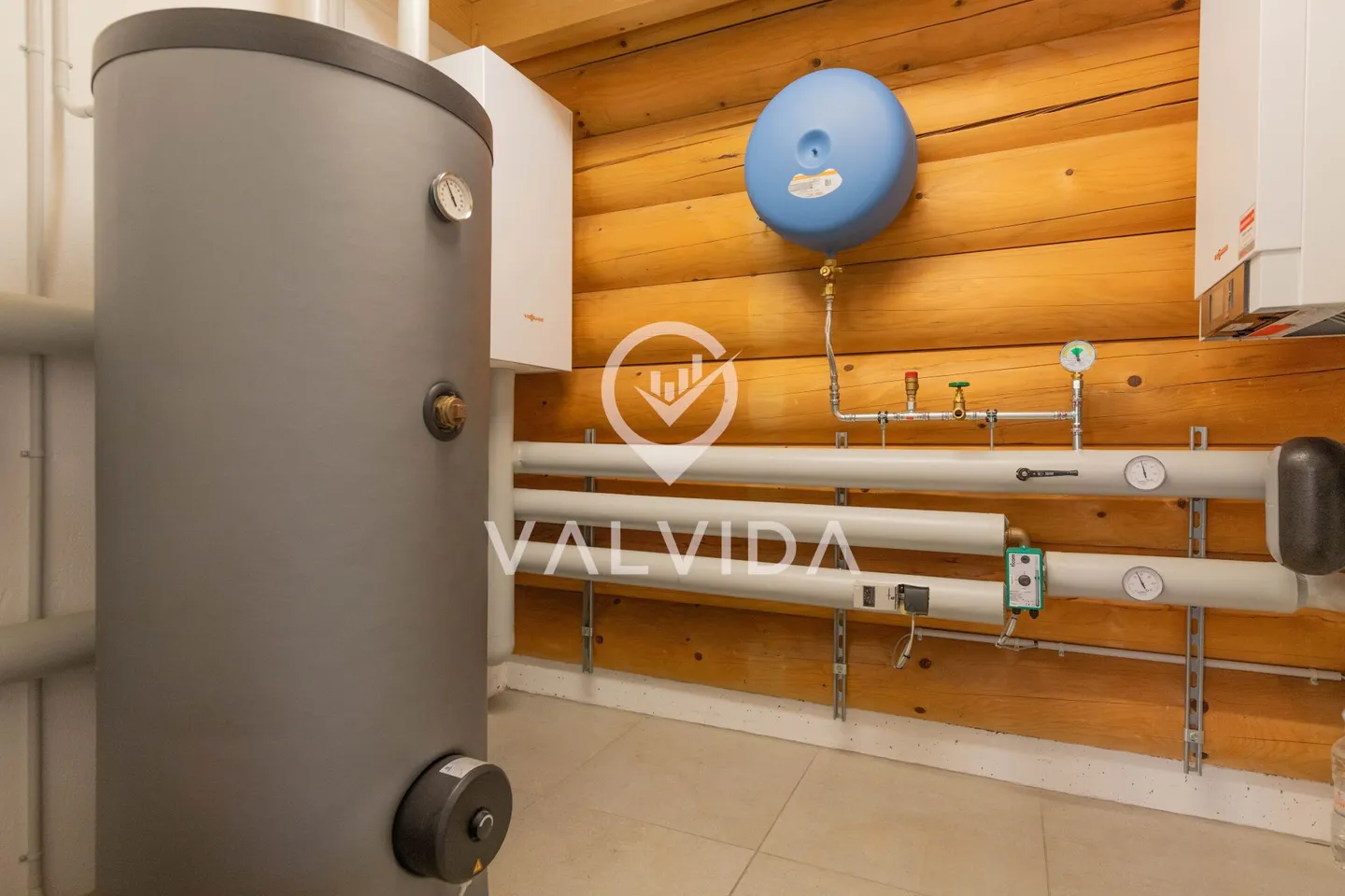 Exklusives Rundholzhaus - Modernes Wohnen im Naturstil - Foto 19 von 25