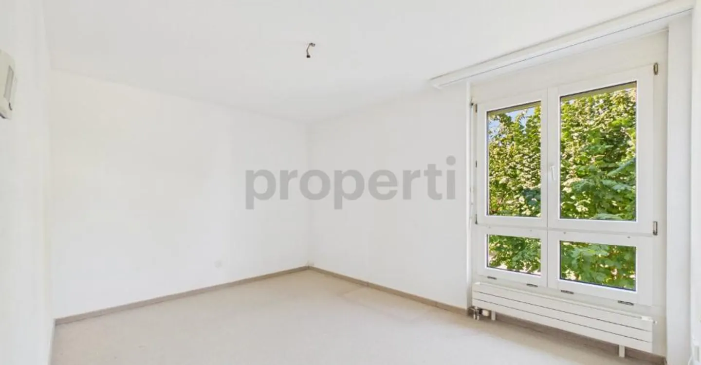Geräumige Wohnung mit Balkon - Foto 8 von 9