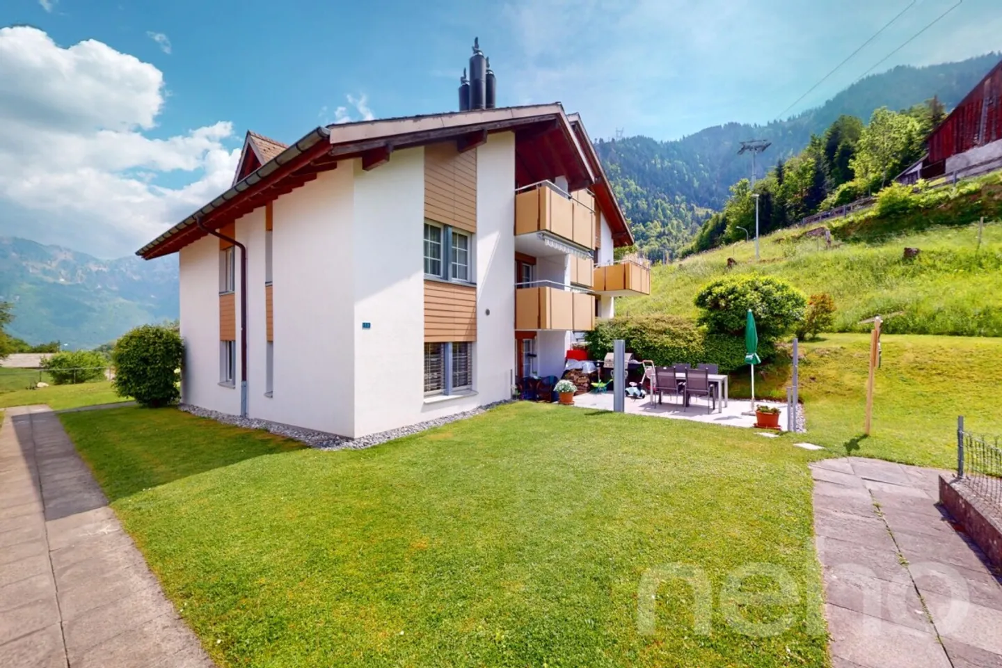Appartamento affascinante di 4,5 stanze con vista sulle montagne a Oberterzen SG - Foto 1 di 13