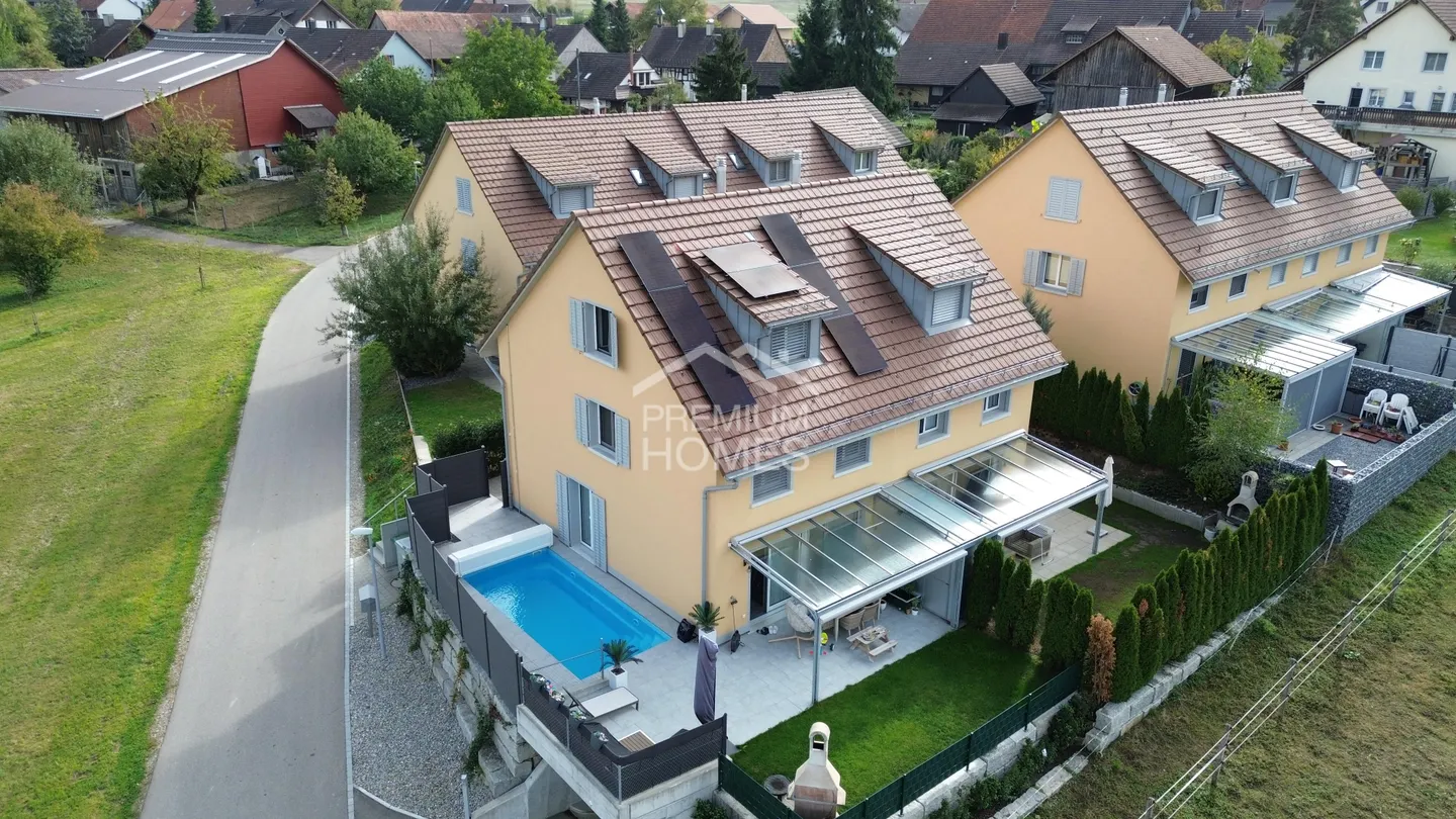 Modern Family Home with Pool - Photo 1 of 12