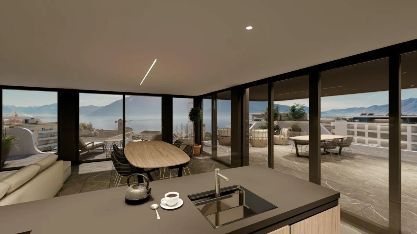 Duplex all'ultimo piano con vista lago e ampie terrazze a Minusio - Foto 1 di 19