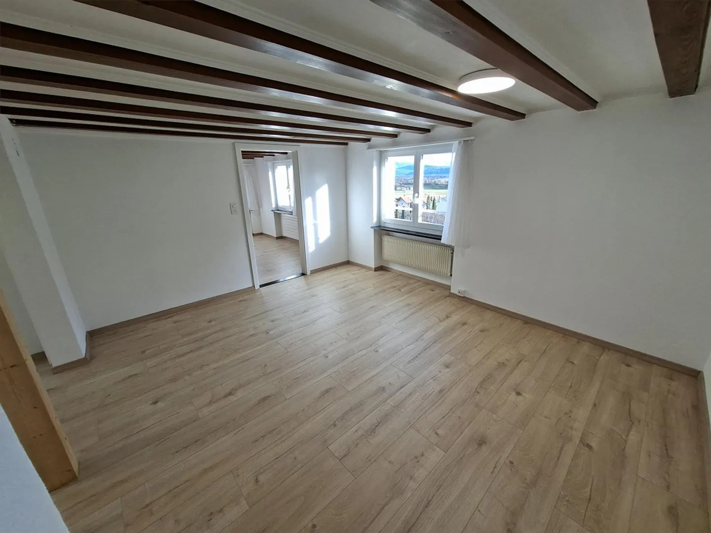 Charmantes Reiheneinfamilienhaus mit Weitsicht und idyllischem Sitzplatz. - Foto 4 von 15