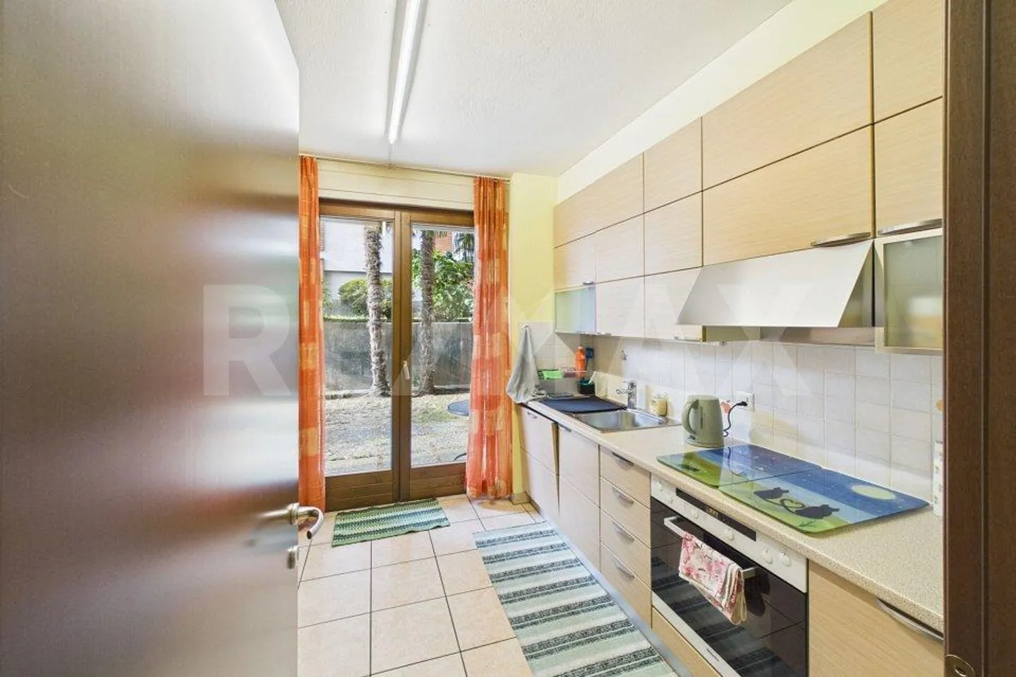 Appartamento di 4½ locali con giardino in posizione soleggiata - Foto 8 von 13