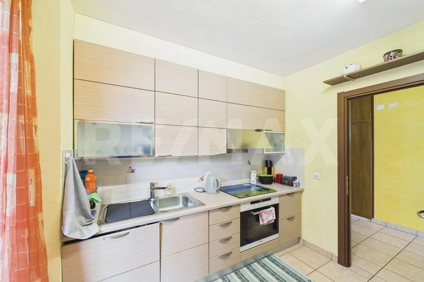 Appartamento di 4½ locali con giardino in posizione soleggiata - Foto 10 von 13