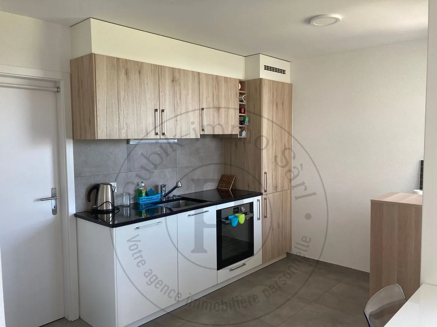 Bell'appartamento di 2,5 stanze con giardino e loggia - Foto 3 di 11